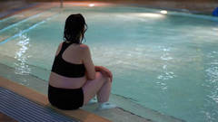 WOMAN WAITING