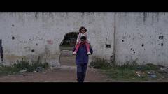 BEHIND THE WALL   ·  AUF DER ANDEREN SEITE DER MAUER